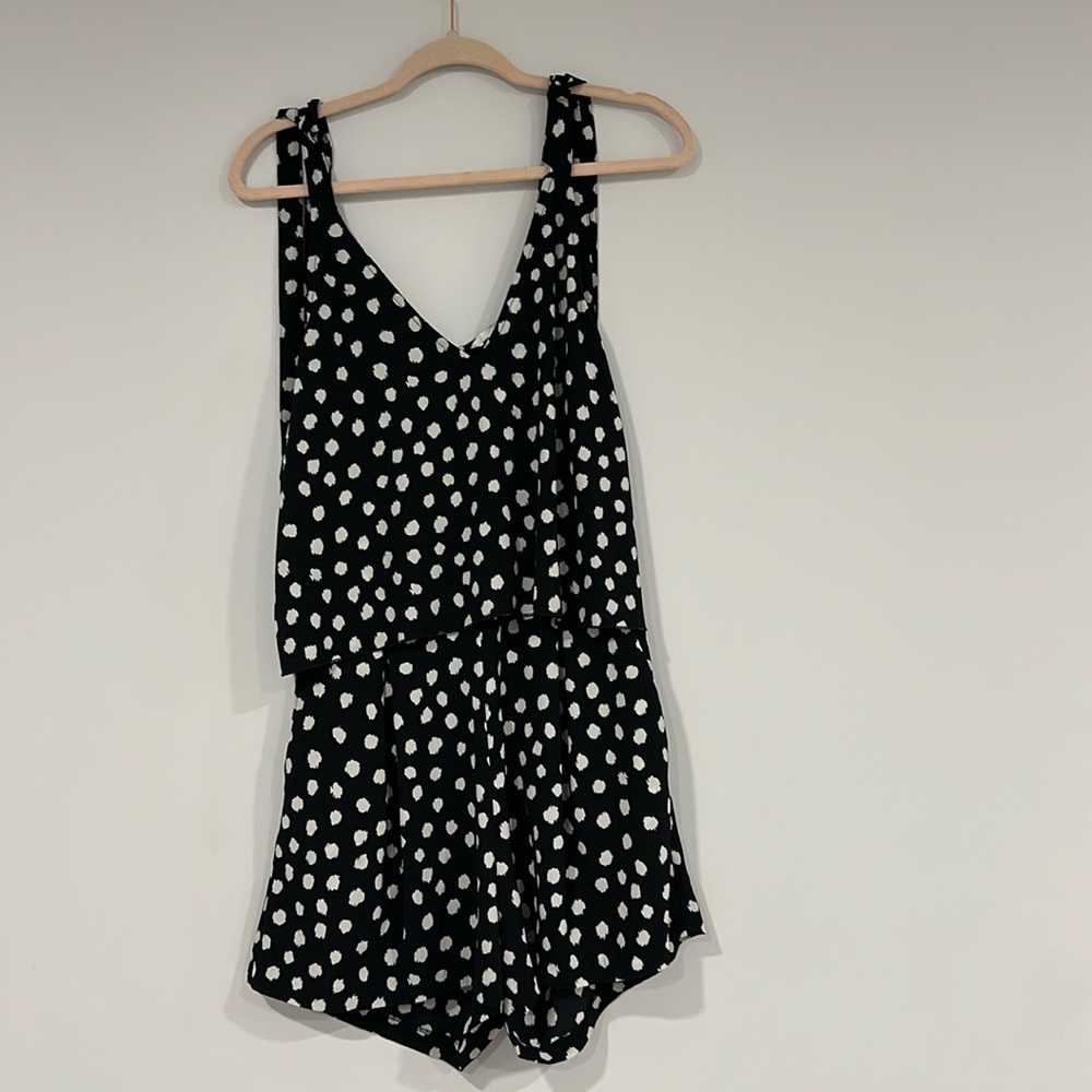 H & M polka dot romper with pockets and open back